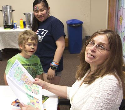 Author Sheree McKewen with coloring at launch